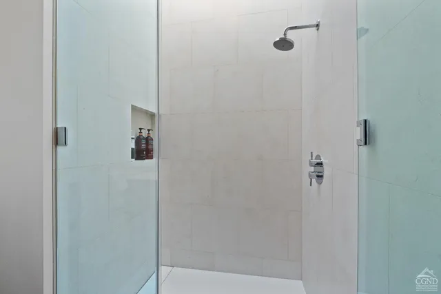 a view of a lush green mountain in the distance