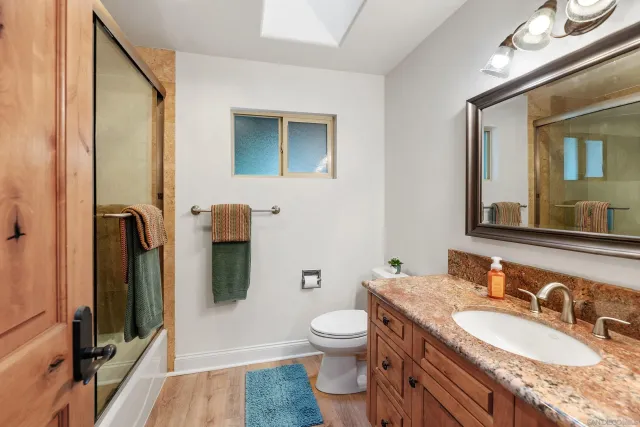 a living room with furniture fireplace and a flat screen tv
