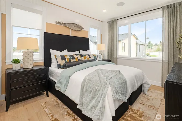 a bedroom with a bed and window