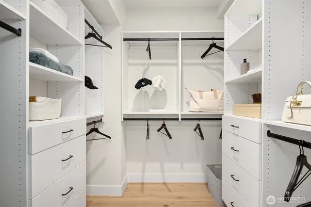 a view of white cabinets and window