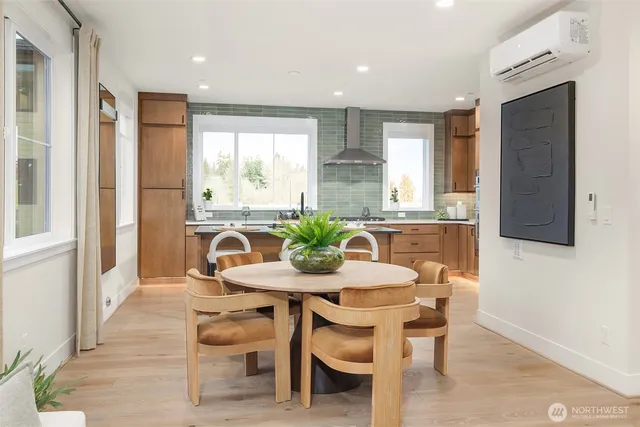 a view of a dining room with furniture window and outside view