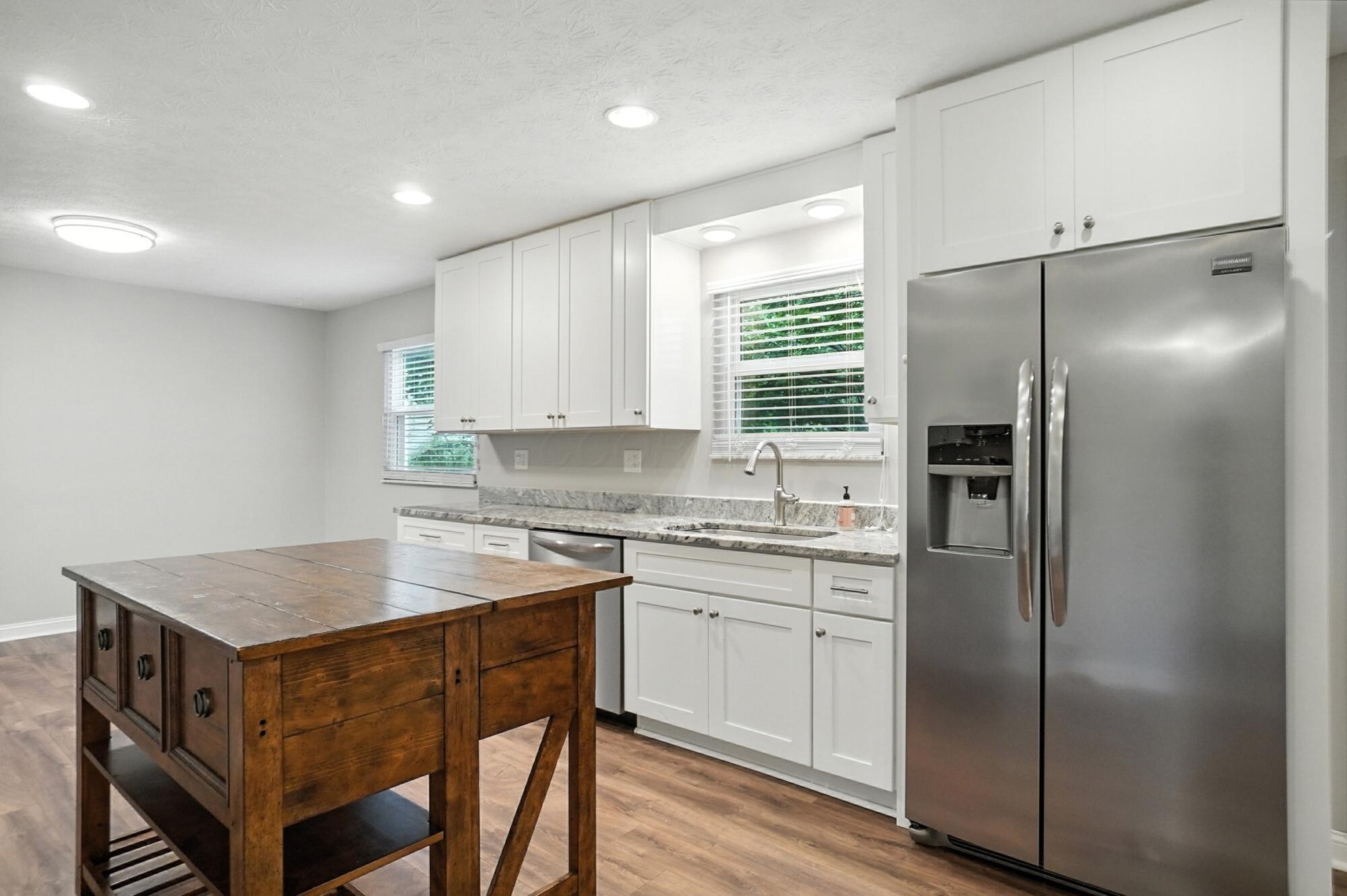 2269 Fishinger Road Upper Arlington, OH 43221 - Photo 22 of 107 refrigerator with water and ice in door