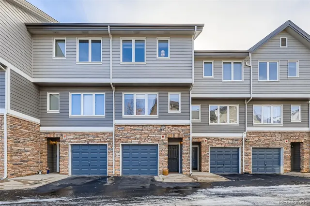 a front view of building with yard