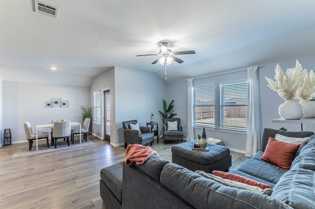 4017 Glastonbury Road McKinney, TX 75071 - Photo 6 of 26 a living room with furniture and wooden floor
