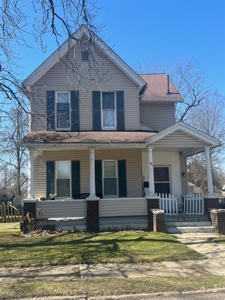 59 Elm Avenue Sharon, PA 16146 - Photo 2 of 2 a view of house with swimming pool and a yard in front of it