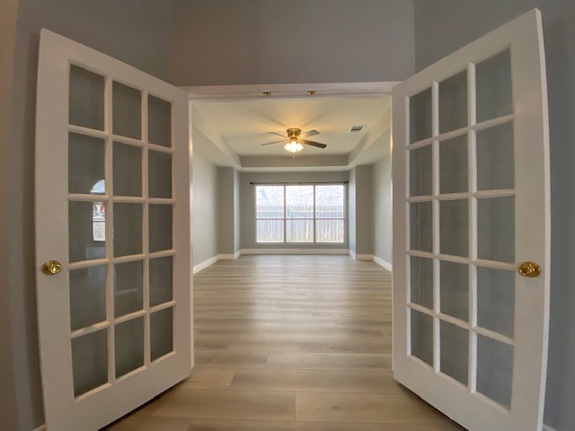 1512 Lorson Loop Round Rock, TX 78665 - Photo 8 of 29 a view of an empty room with a window and wooden floor