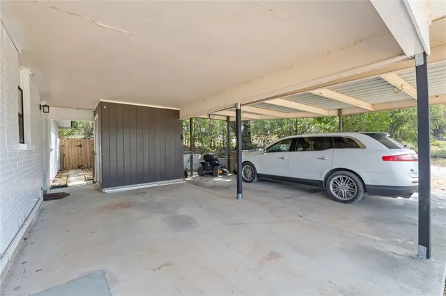 a view of parking area with parking space
