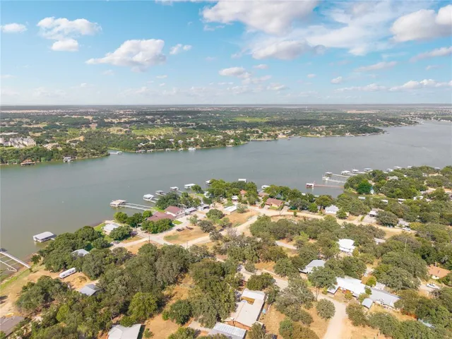 a view of a lake with a city