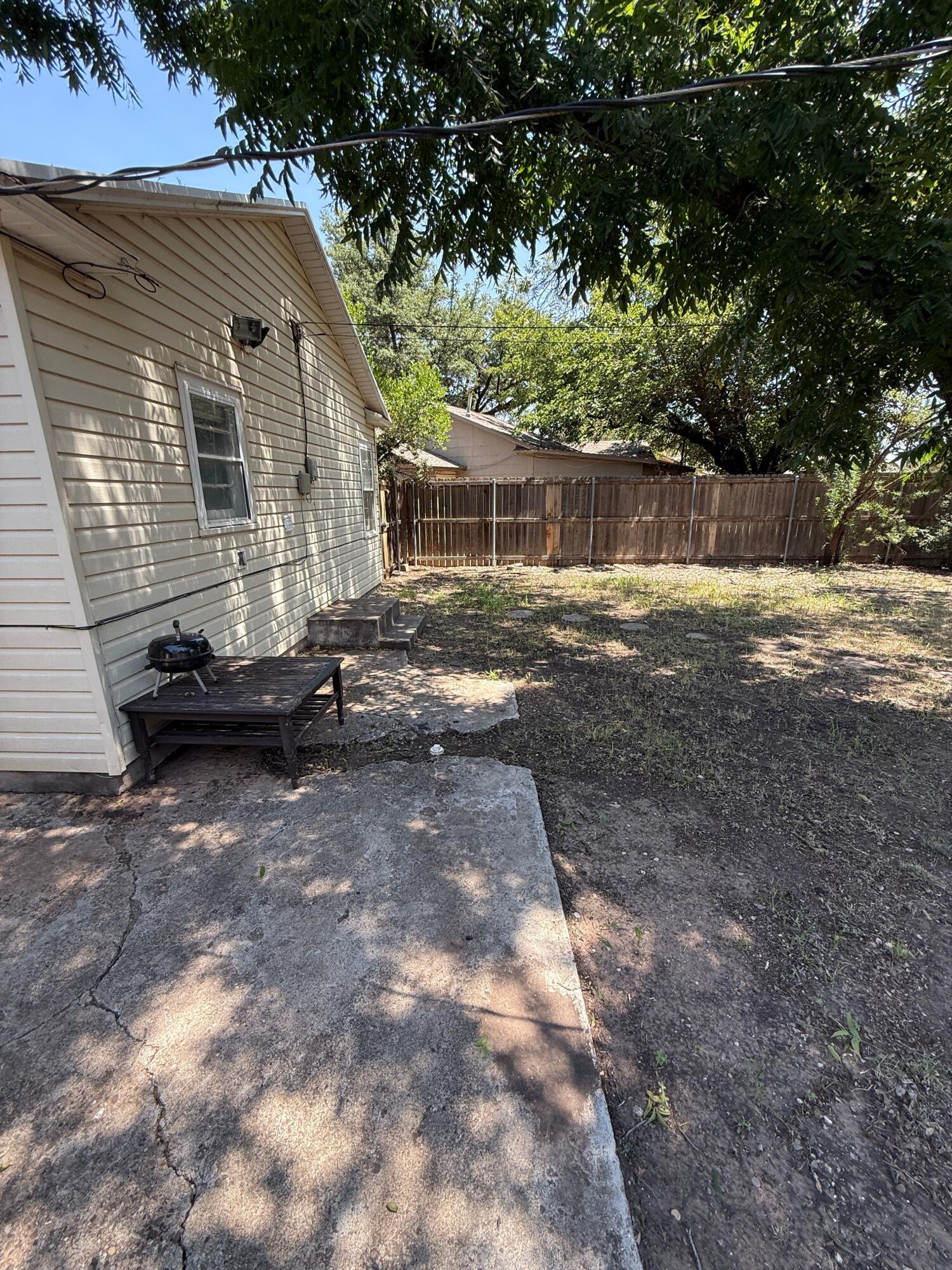 2805 27th Street Lubbock, TX 79410 - Photo 11 of 11 a view of a house with backyard and trees