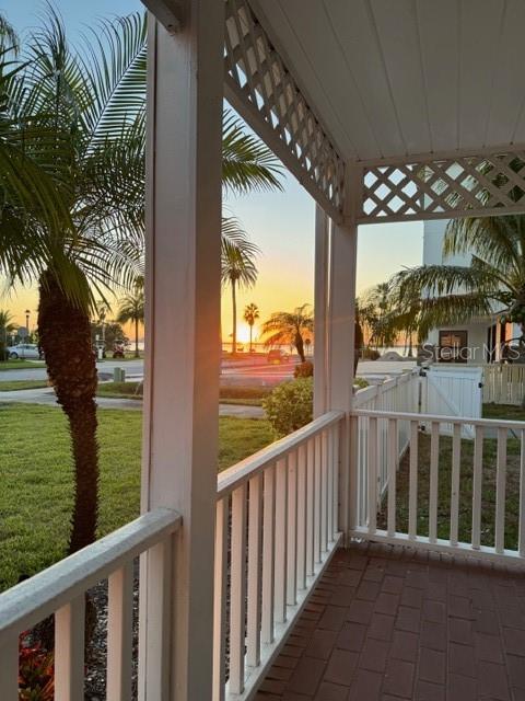 220 Lyndhurst Street Dunedin, FL 34698 - Photo 9 of 20 a view of a glass door with a balcony