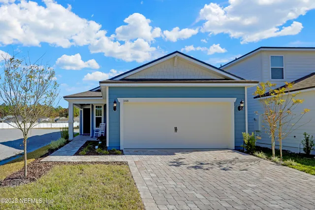 a view of a house with basketball space
