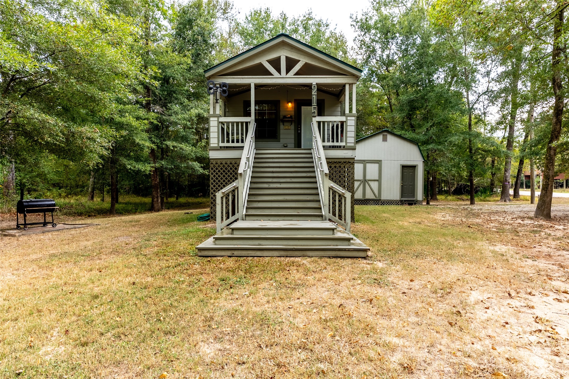 215 Center Street Cleveland, TX 77327 - Photo 1 of 38 a front view of a house with a yard