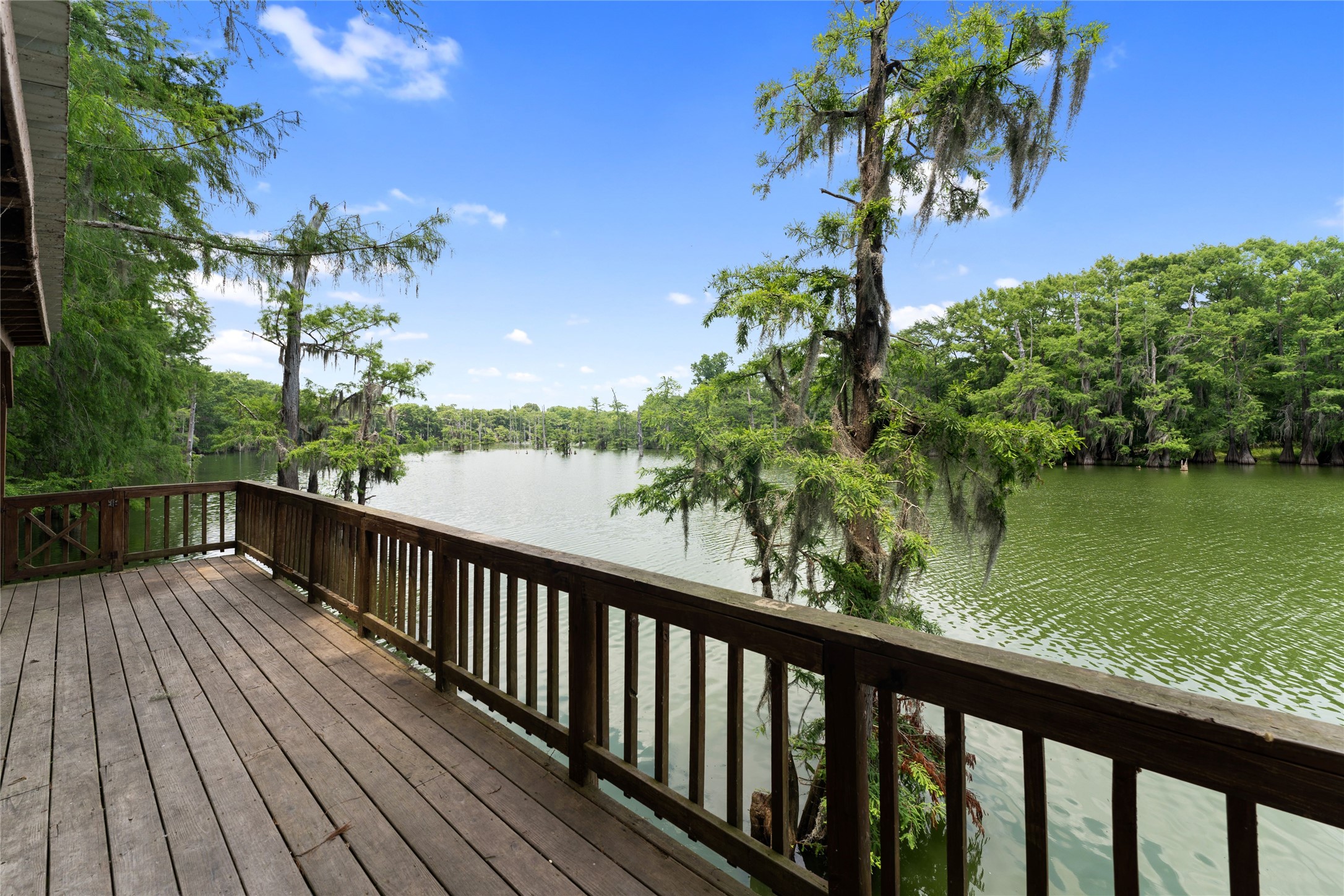 215 Center Street Cleveland, TX 77327 - Photo 29 of 38 a view of balcony with wooden floor and outdoor space