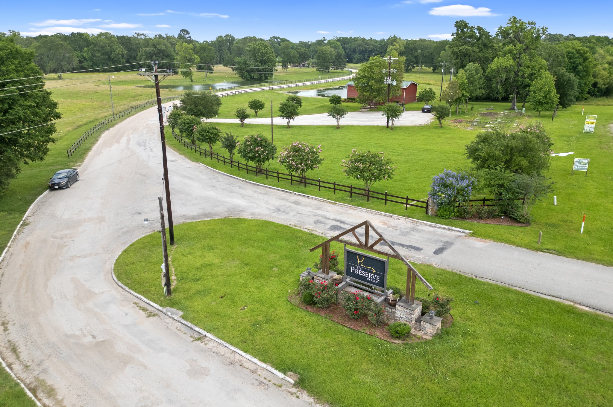 215 Center Street Cleveland, TX 77327 - Photo 38 of 38 a view of a lake with a yard
