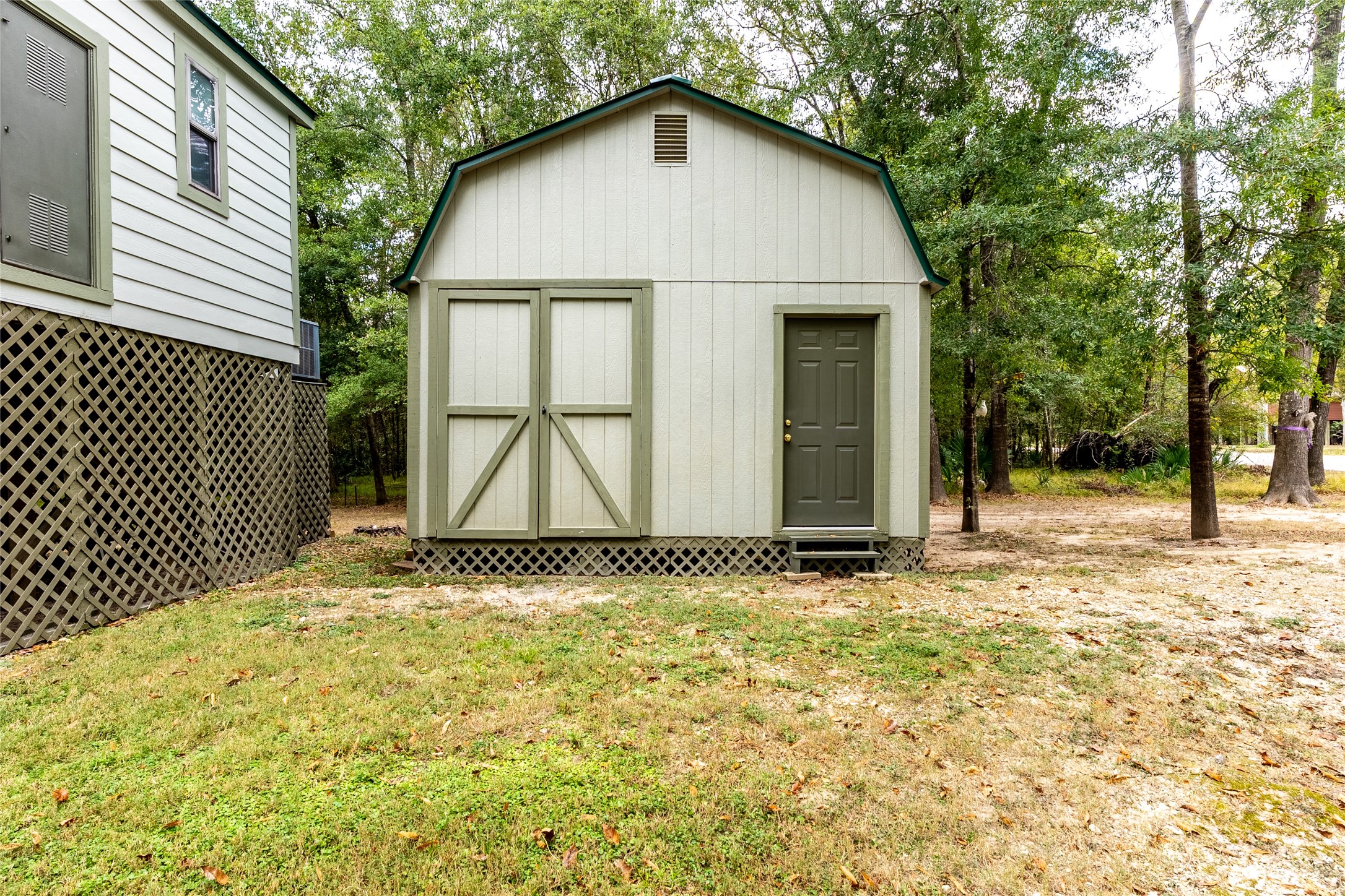 215 Center Street Cleveland, TX 77327 - Photo 7 of 38 a view of a house with a yard