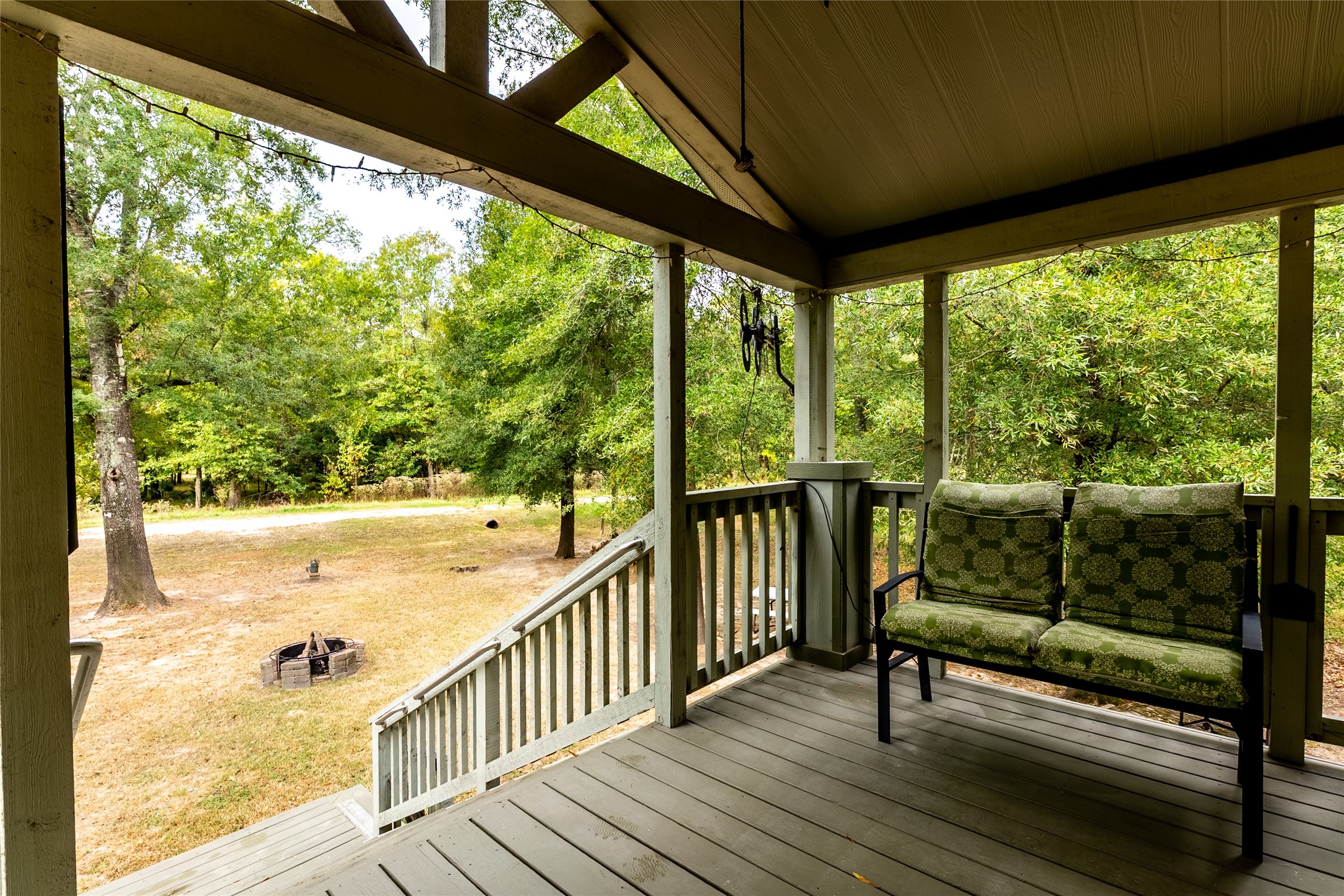 215 Center Street Cleveland, TX 77327 - Photo 10 of 38 a view of a two chair in the balcony