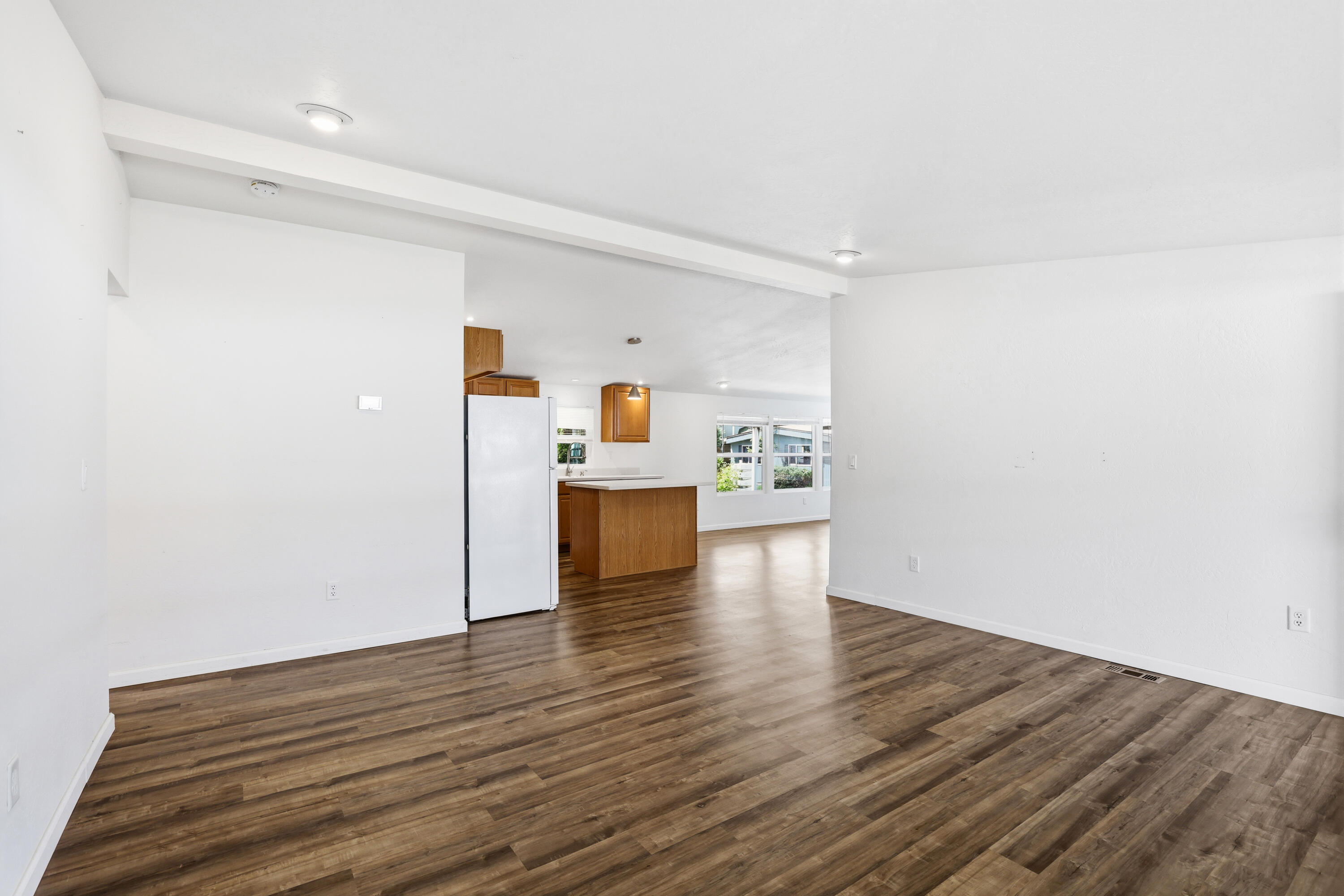 8401 Old Stage Road, Unit 16 Central Point, OR 97502 - Photo 6 of 23 a view of a kitchen with wooden floor