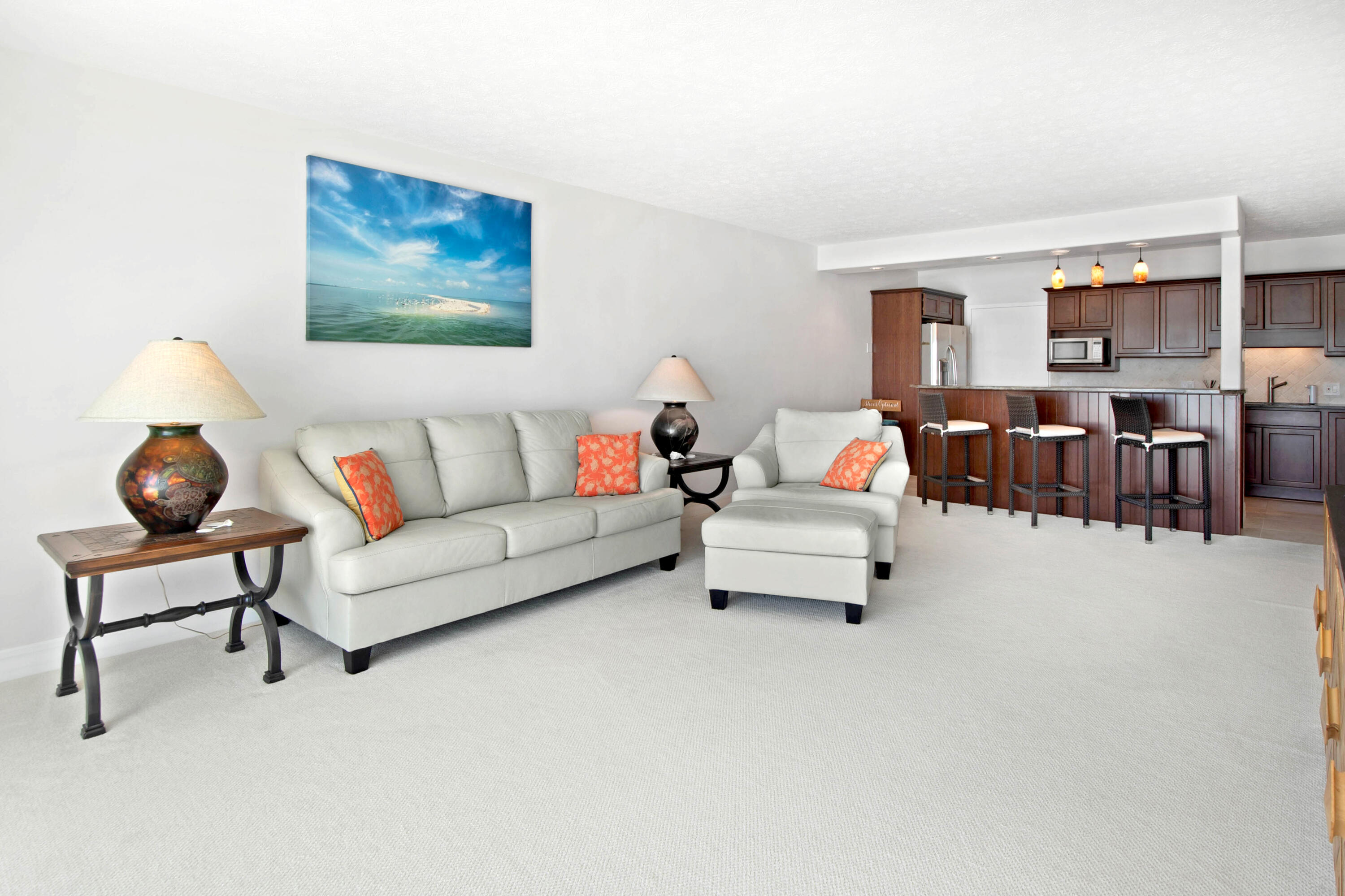 60 West Pelican Street, Unit 206 Naples, FL 34113 - Photo 7 of 29 a living room with furniture and a couch