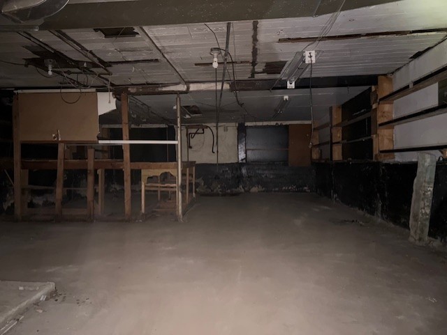 251 West 105th Place Chicago, IL 60628 - Photo 11 of 13 a view of a room with wooden walls