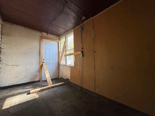 251 West 105th Place Chicago, IL 60628 - Photo 6 of 13 a view of a room with wooden walls