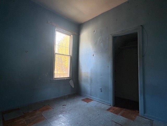 251 West 105th Place Chicago, IL 60628 - Photo 9 of 13 a view of an empty room with window
