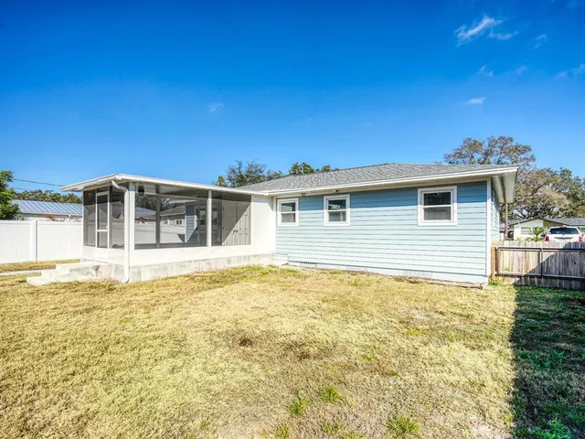 a view of a house with a swimming pool