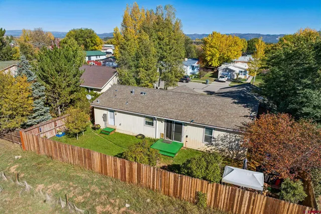 a house view with a garden space