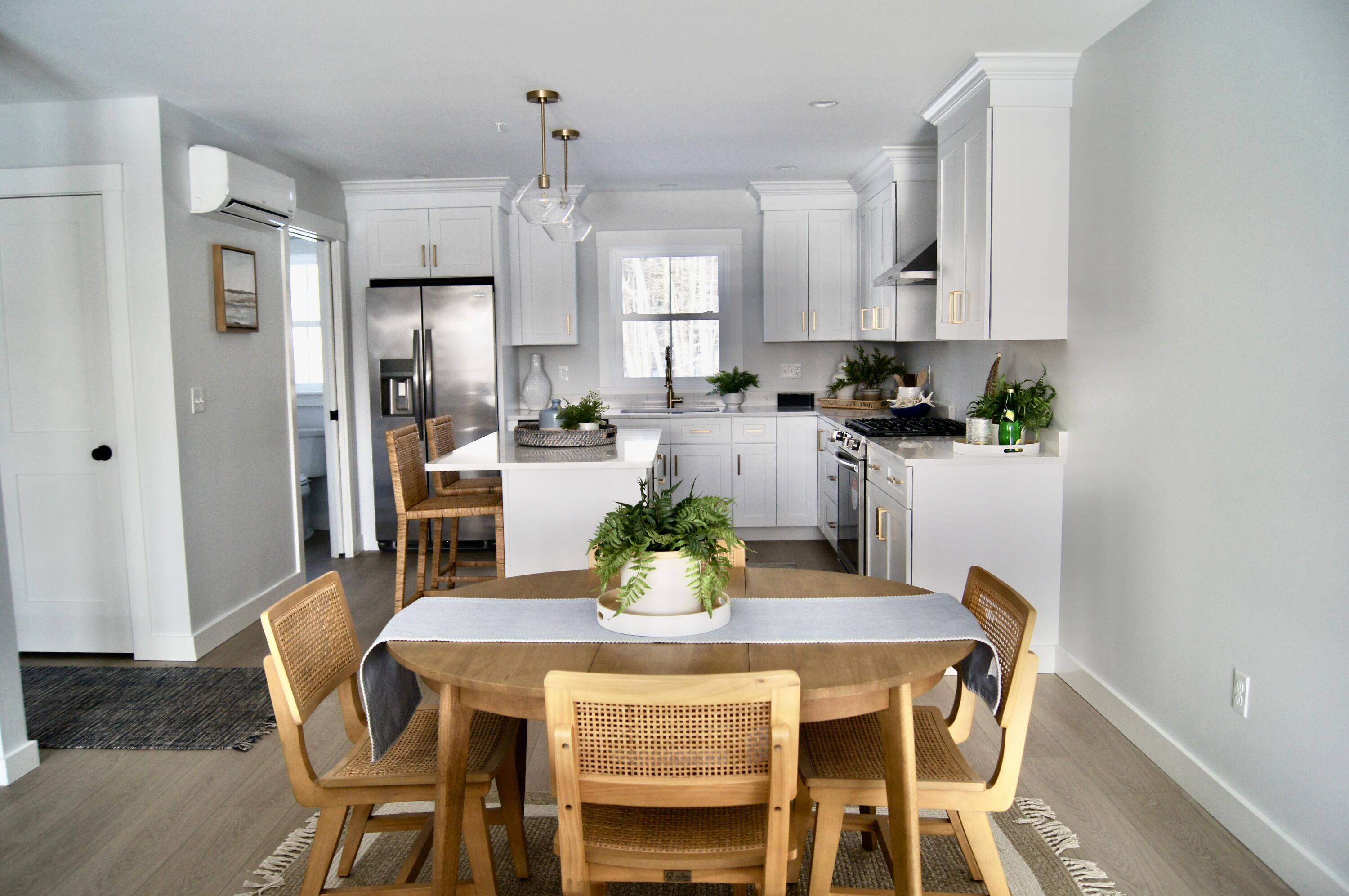 20 Salt Point Drive, Unit 22 Old Orchard Beach, ME 04064 - Photo 6 of 40 dining to kitchen