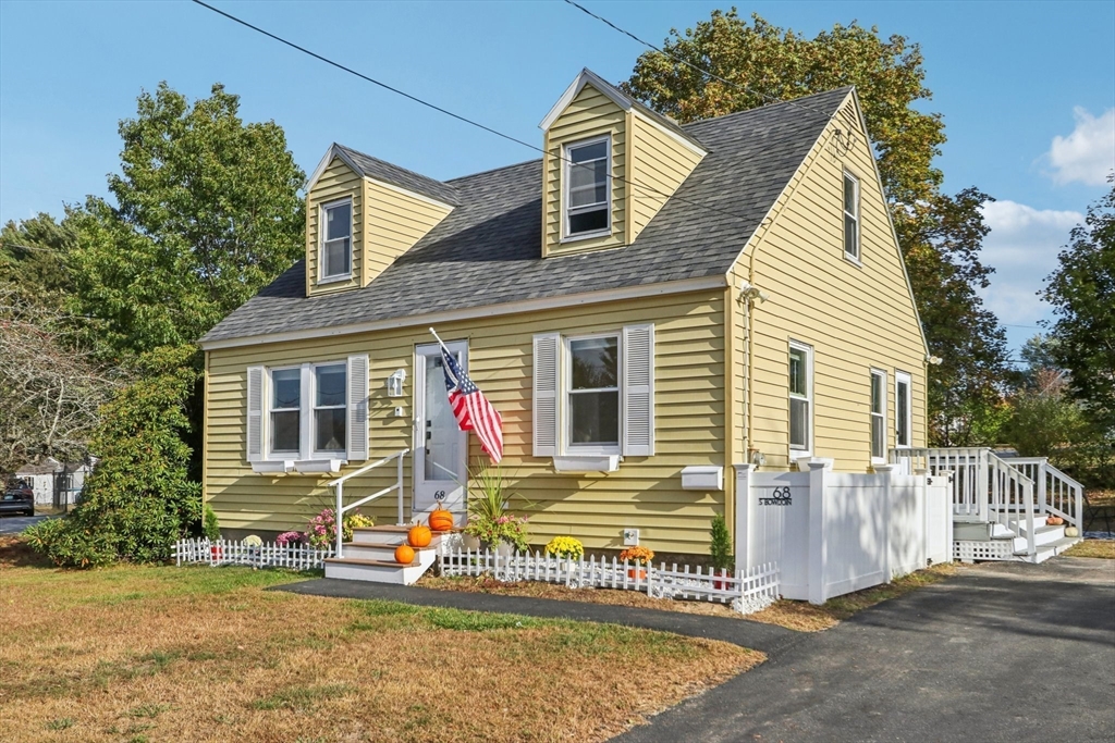 front view of a house with a patio