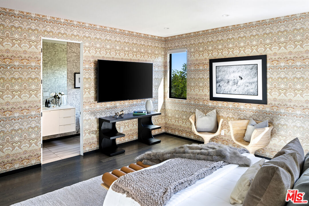 1516 North Kings Road Los Angeles, CA 90069 - Photo 23 of 45 a living room with furniture and a flat screen tv