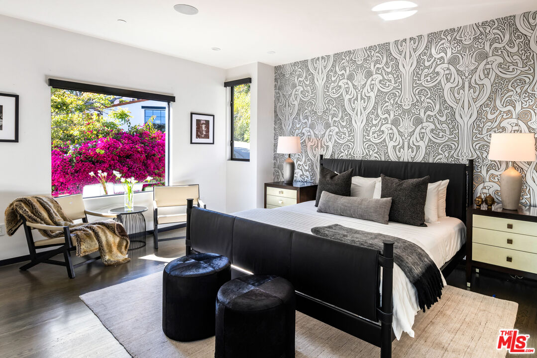 1516 North Kings Road Los Angeles, CA 90069 - Photo 25 of 45 a bedroom with a bed and furniture