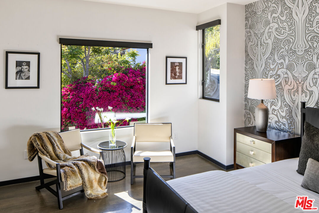 1516 North Kings Road Los Angeles, CA 90069 - Photo 26 of 45 a living room with furniture and a large window