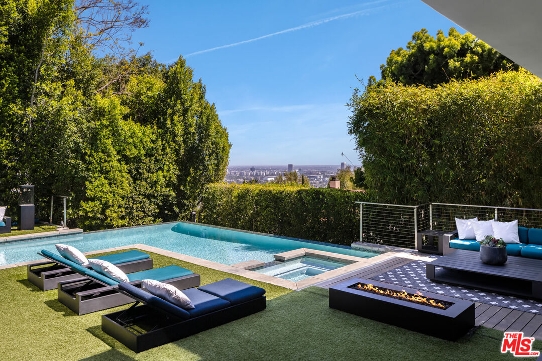 1516 North Kings Road Los Angeles, CA 90069 - Photo 31 of 45 a view of swimming pool with lounge chair