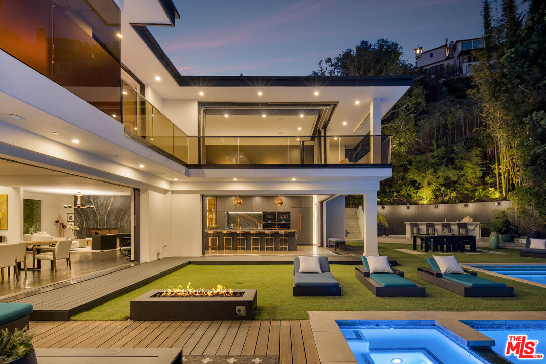 1516 North Kings Road Los Angeles, CA 90069 - Photo 39 of 45 a view of swimming pool with seating area and furniture