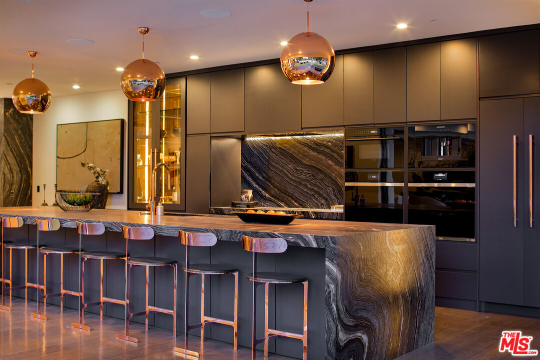 1516 North Kings Road Los Angeles, CA 90069 - Photo 40 of 45 a view of a dining room with furniture