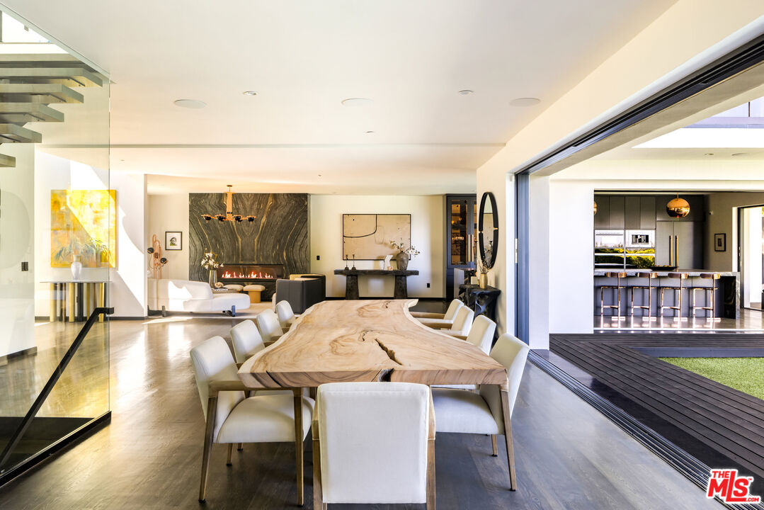 1516 North Kings Road Los Angeles, CA 90069 - Photo 8 of 45 a view of a dining room with furniture window and wooden floor