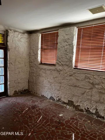 a view of a backyard of a house