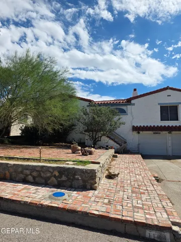 a view of a swimming pool with a yard