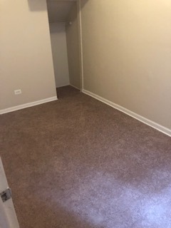 6507 South Rhodes Avenue Chicago, IL 60637 - Photo 5 of 9 a view of an empty room