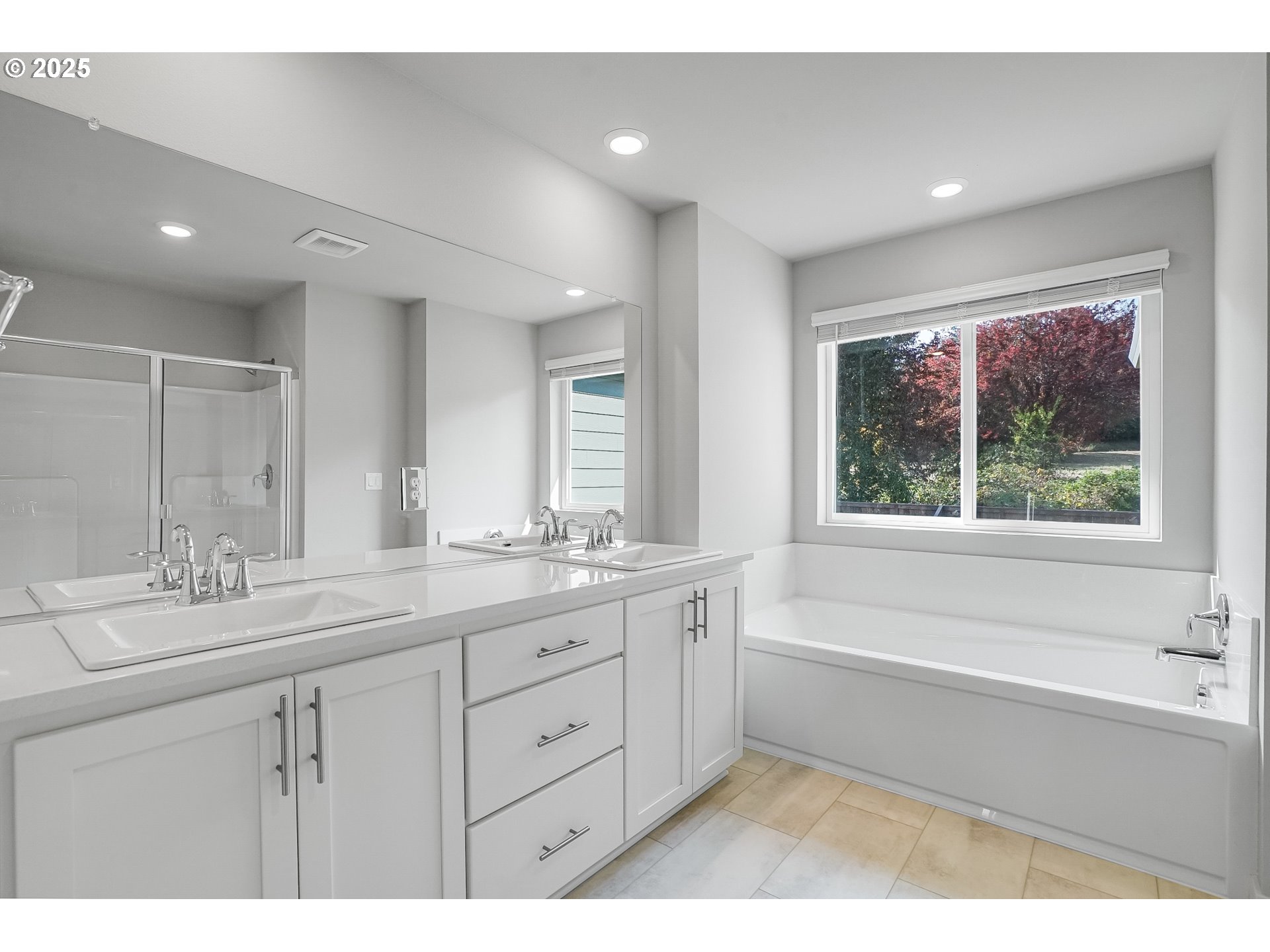 3230 Misty Lane Forest Grove, OR 97116 - Photo 27 of 33 a bathroom with a sink double vanity granite tub and a mirror
