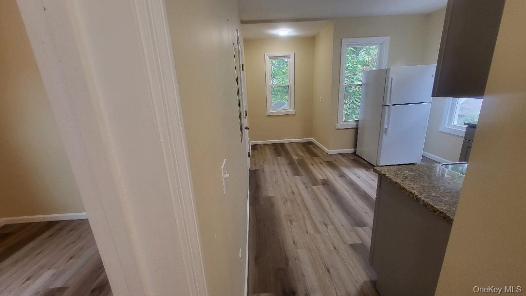 19 Hoffman Avenue, Unit 2 Poughkeepsie, NY 12603 - Photo 13 of 21 a view of hallway with wooden floor
