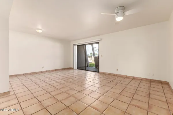 a view of an empty room and window