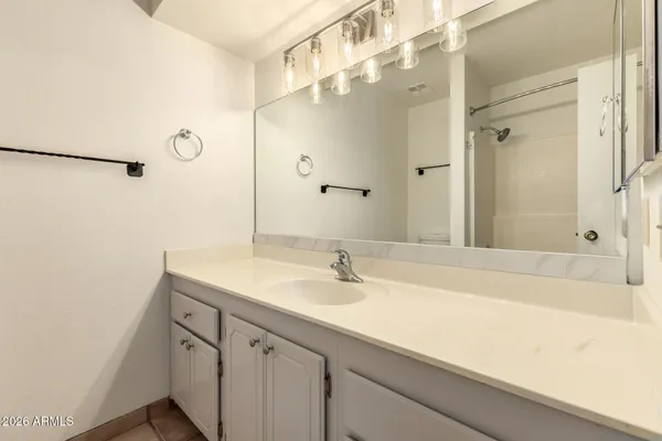 a bathroom with a sink and a bathtub