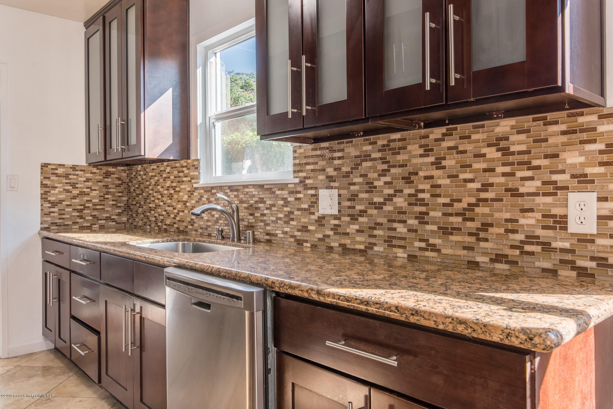 60 Marathon Road Altadena, CA 91001 - Photo 13 of 35 a kitchen with granite countertop a sink and a stove