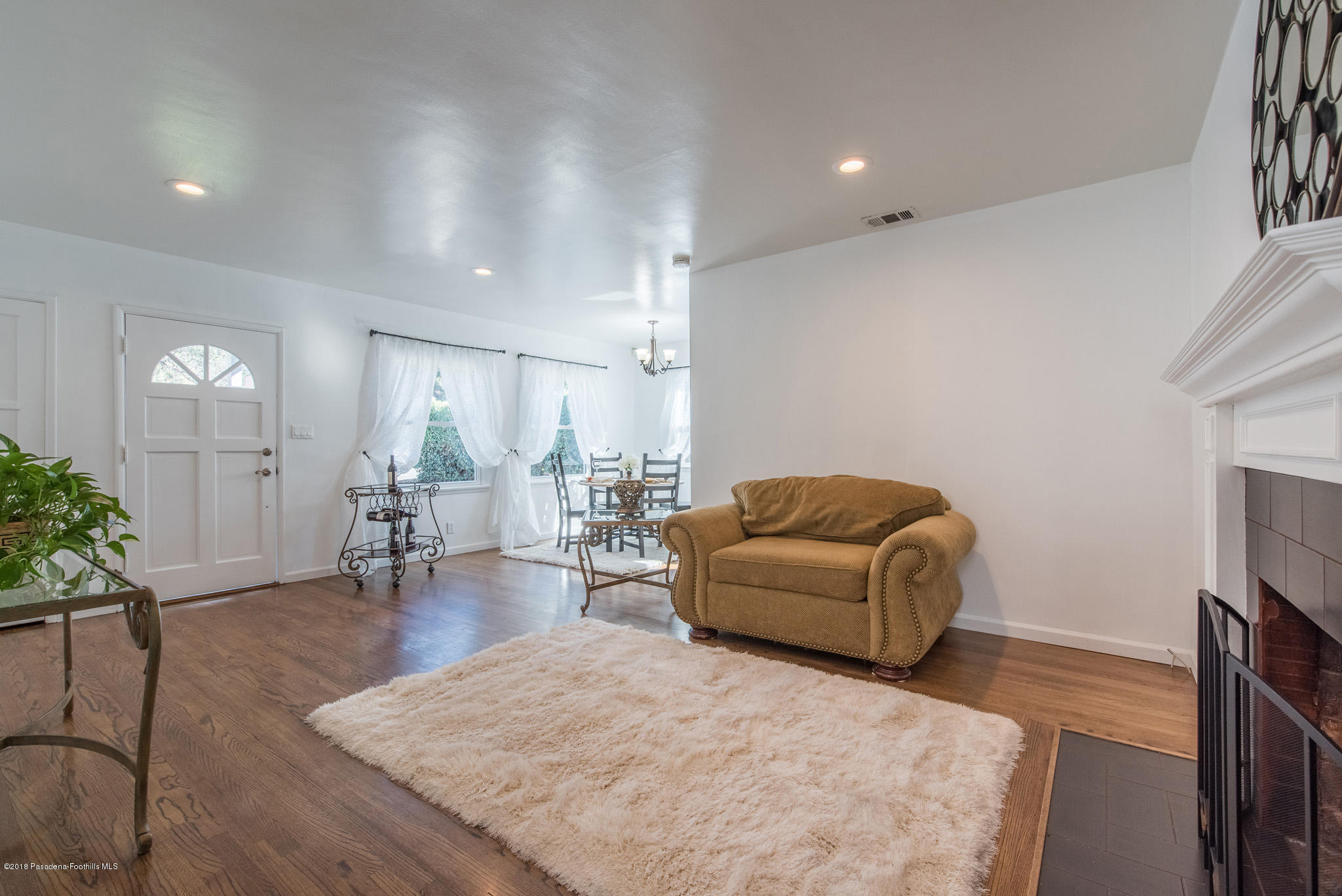 60 Marathon Road Altadena, CA 91001 - Photo 8 of 35 a living room with furniture and a wooden floor
