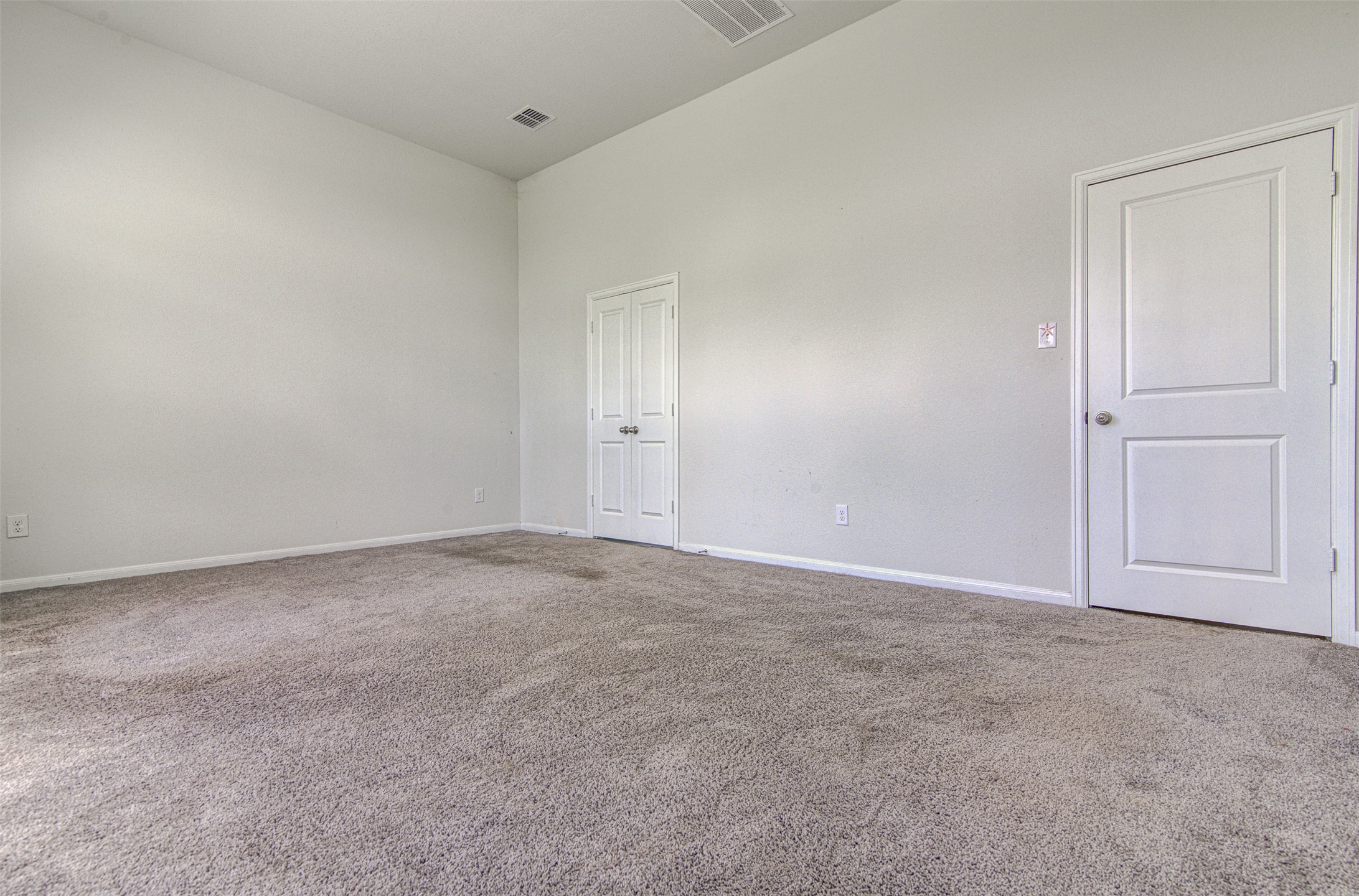 774 Cherrystone Loop Buda, TX 78610 - Photo 17 of 38 An inviting room awaits with neutral carpet and ample wall space.