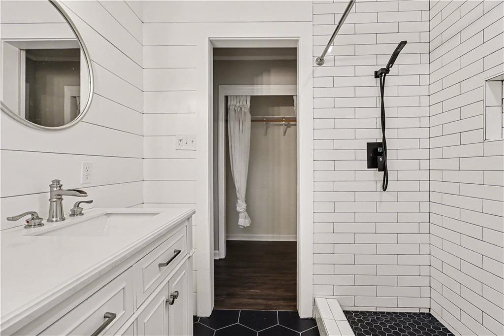 4139 Rebecca Street Southwest Covington, GA 30014 - Photo 21 of 33 a bathroom with a sink and a shower