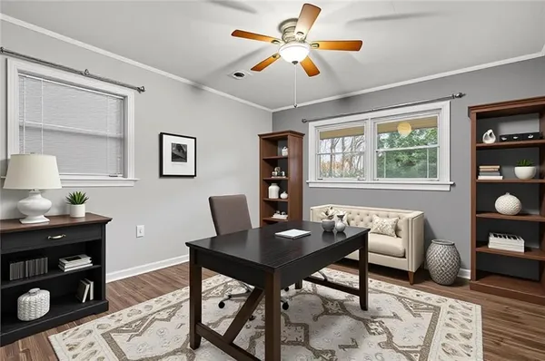 a workspace with furniture window and wooden floor