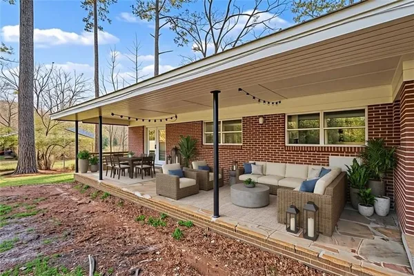 a view of a chairs with a patio