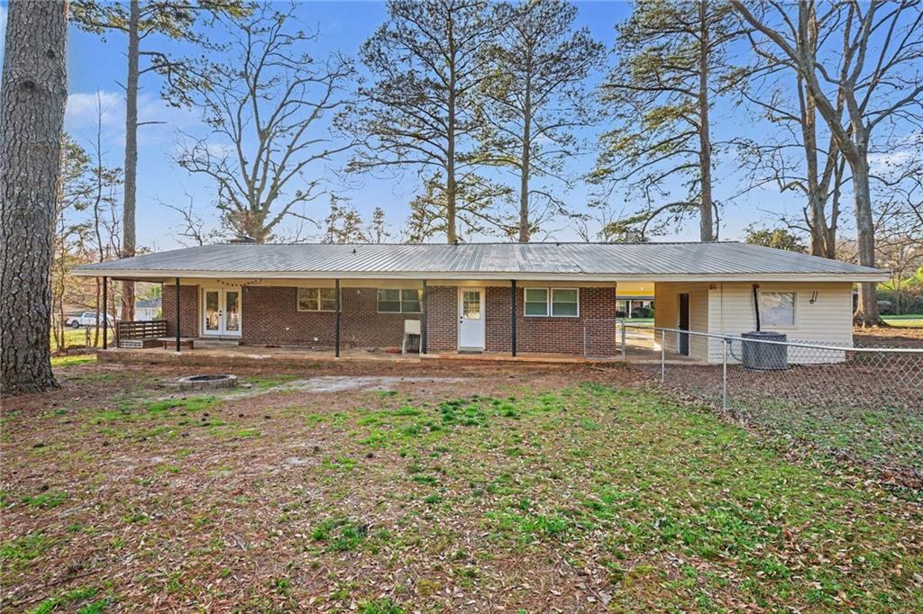 4139 Rebecca Street Southwest Covington, GA 30014 - Photo 31 of 33 front view of a house with a yard